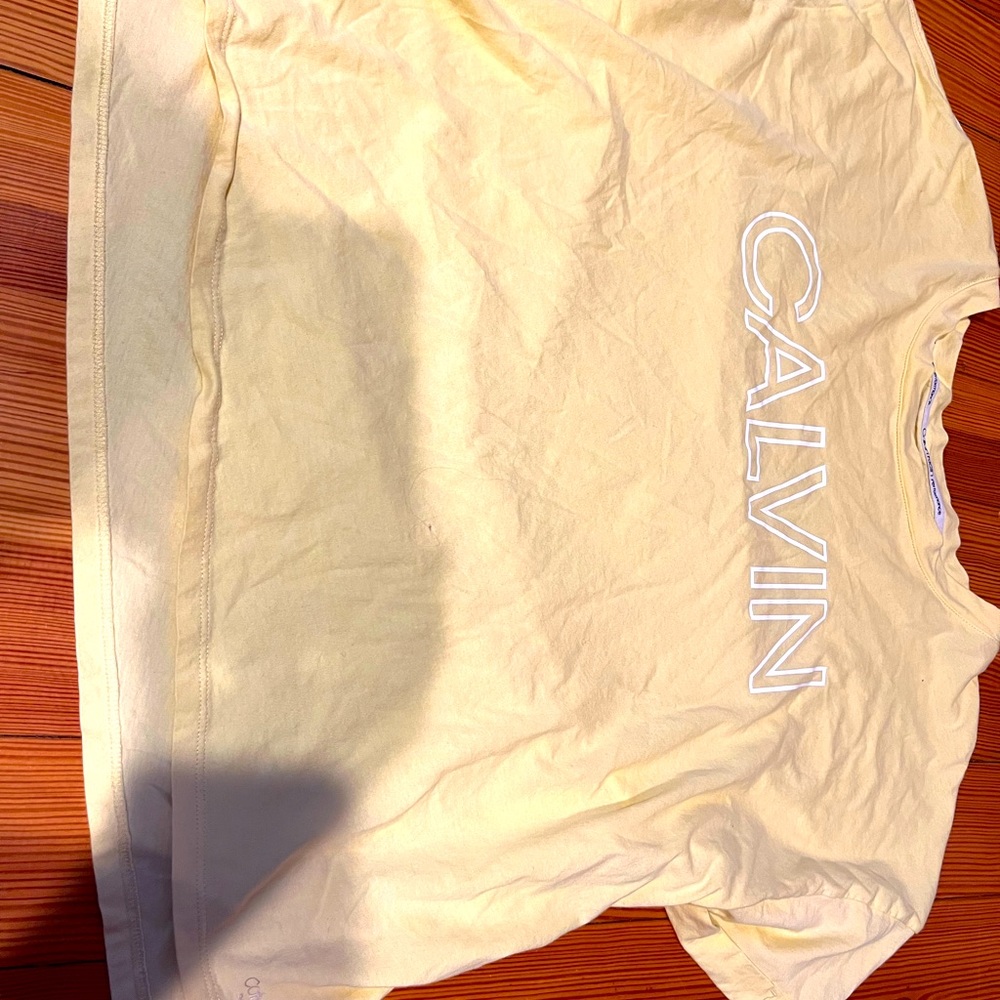 Yellow Calvin tee.